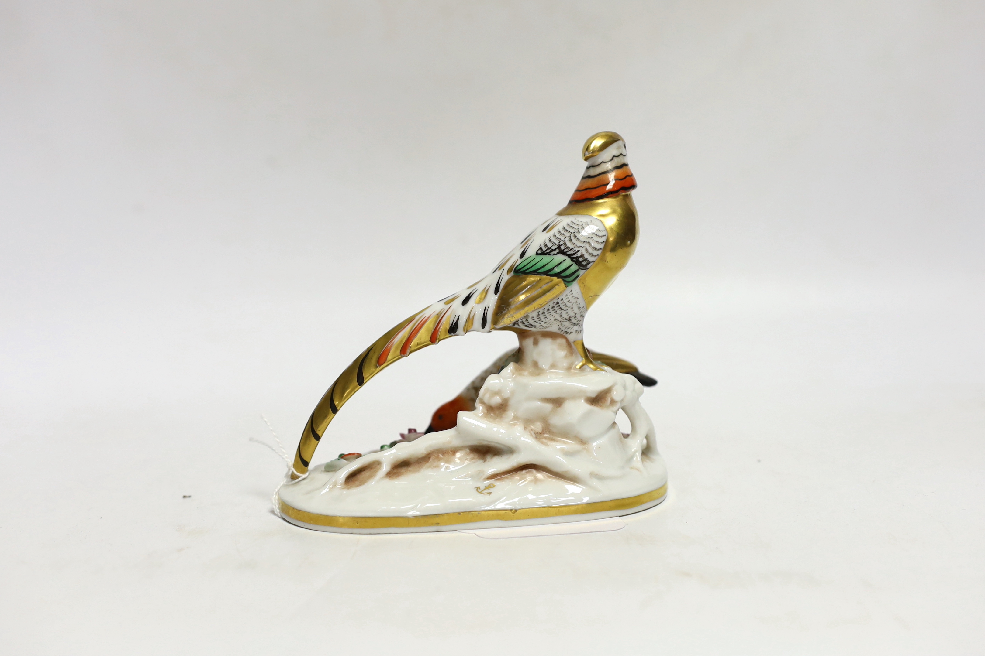 A continental porcelain pheasant group with gilt bodies, 12cm